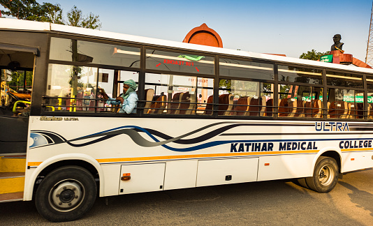 Katihar,Bihar/India-05/10/2020; Katihar medical college hospital (KMCH) bus on corona COVID 19 duty for medical staffs and students, in front of Katihar Junction railway station at GRP / LOknayak JP chowk Bihar 854105