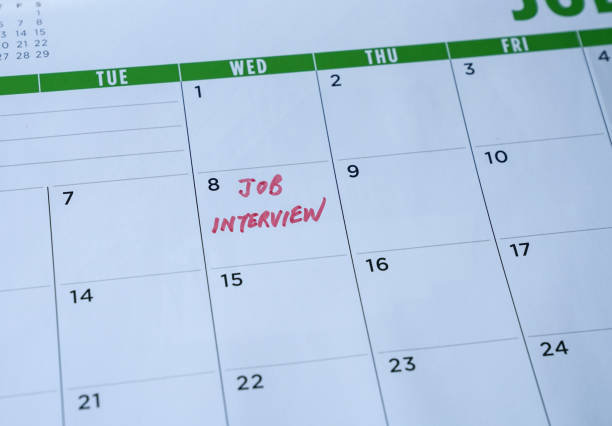 istock Job interview, red color words on calendar. 1223921972