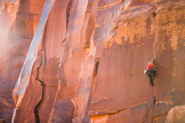 istock Strong young woman rock climbing in Utah 1223925804