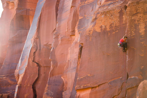 istock Strong young woman rock climbing in Utah 1223926462