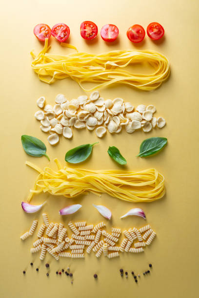 istock Different pasta overhead view, raw italian pasta 1223935097