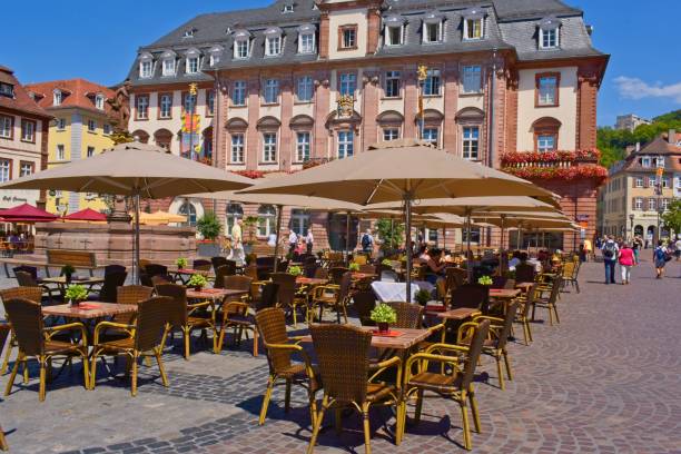 Heidelberg, Baden Wuerttemberg, Germany - July18, 2018: Street cafe in the Main Street in Heidelberg.