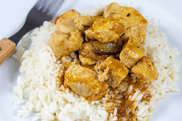 istock chicken stir-fry with vegetables and rice 1223940317