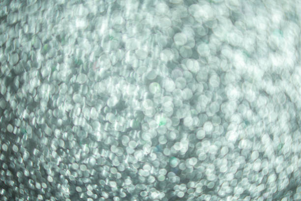 istock Silver glitter, silver bokeh texture for christmas abstract background. 1223940391