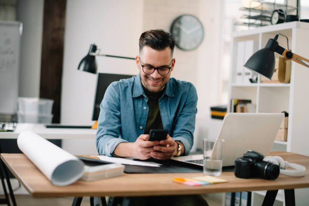 istock Handsome businessman working in office. 1223941932