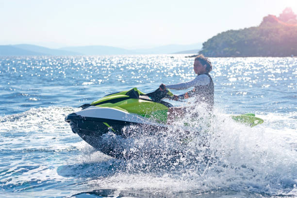 istock Jet ski on turquoise sea on a blue day 1223944856