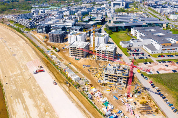 istock Construction site with cranes. Construction workers are building.Aerial view.Top view. 1223944940
