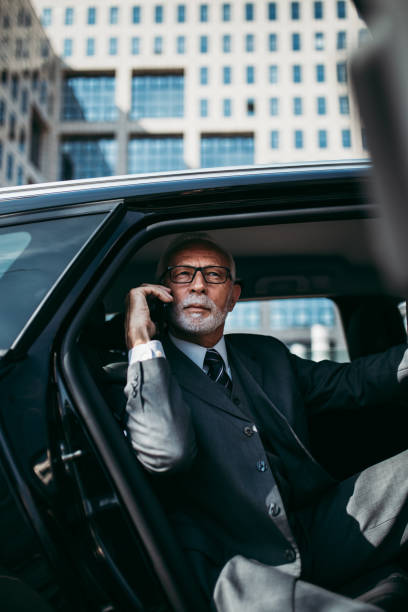 istock Senior business man in car 1223948190
