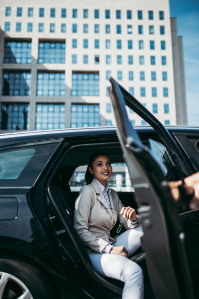 istock Young business woman in car 1223948201