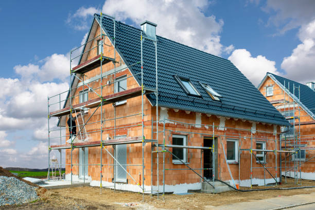 new built house in construction new built house in construction building activity stock pictures, royalty-free photos & images