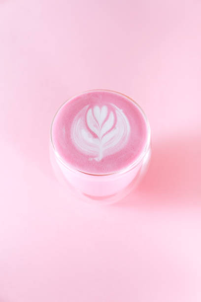 istock matcha latte with rosetta art on pink background 1223951656