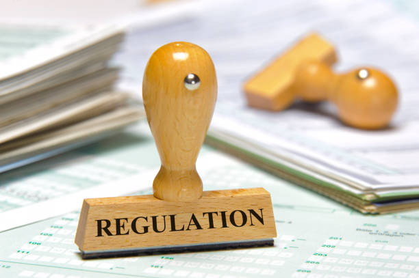 istock rules and regulations marked on rubber stamp 1223953881