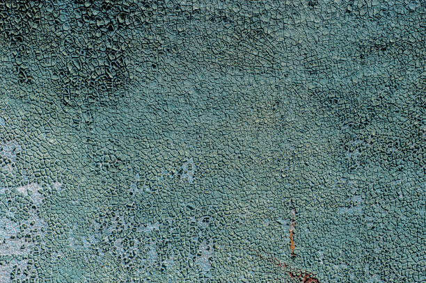 istock Texture of an old surface covered with dried blue paint 1223955290