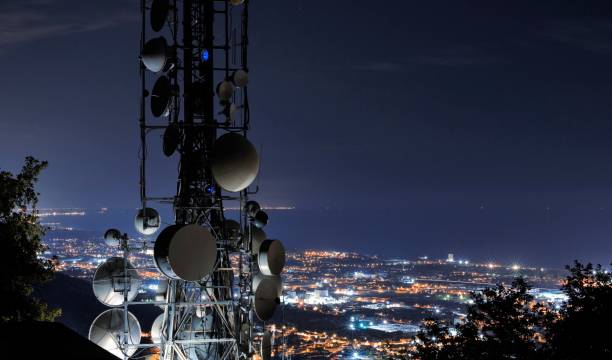 Network repeaters, base transceiver. Telecommunications tower, antenna and satellite. Cellular station for smart city connect, aerial view. Big data, connection, technology concept. radio stock pictures, royalty-free photos & images