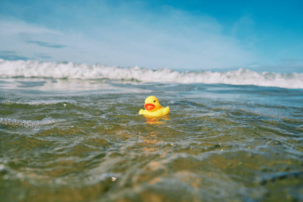 istock Rubber duck floating on the sea surface on a sunny day. 1223957421