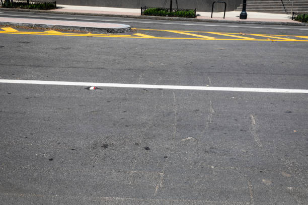 istock Asphalt street with traffic island and formed curbs, copy space 1223963084