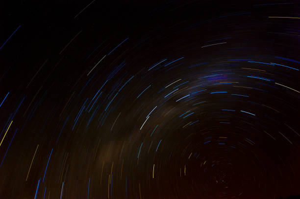 istock Colorful Star Trails Travel Across a Dark Sky 1223963151