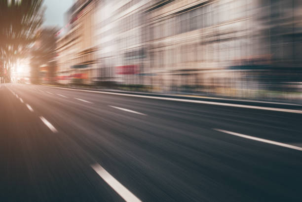 istock Abstract modern urban architecture and open asphalt road 1223964614