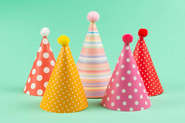 istock Colorful birthday caps on mint background. 1223965707