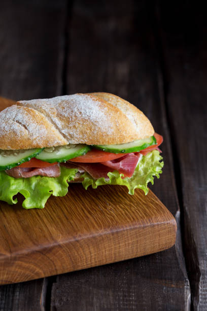 istock Close up sandwich on wood board 1223968511