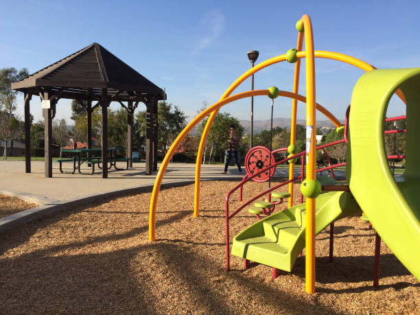 istock New modern Playground equipment green plastic at park school 1223968647