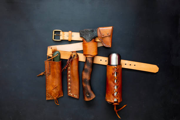 istock bushcraft leather belt and ax, knife, water flask 1223969259