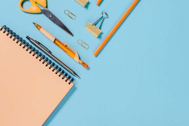 istock School stationary , Back to school concept colorfull flatlay. Pencils,notepad, ruler scissors and paper clips.Top horizontal view copyspace 1223971801
