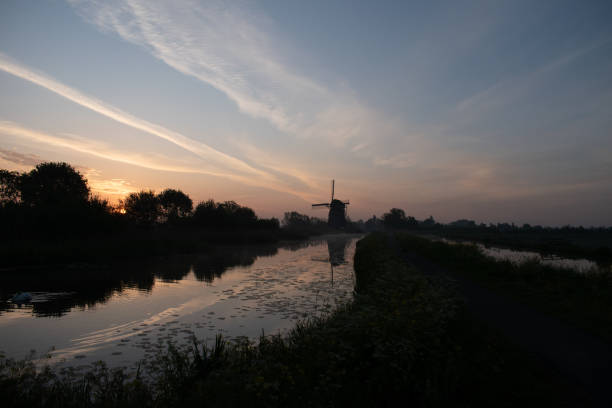 A morning sunrise at a dutch windmill