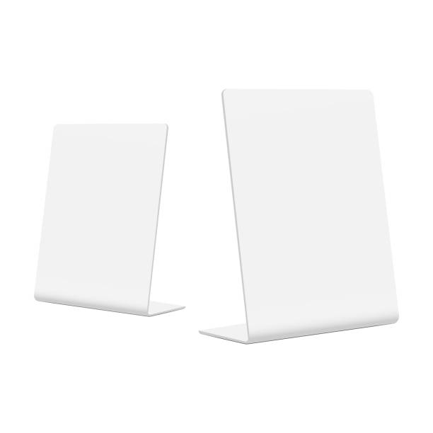Plastic table tent mockup isolated on white background, side view Plastic table tent mockup isolated on white background, side view. Vector illustration restaurant table side view stock illustrations