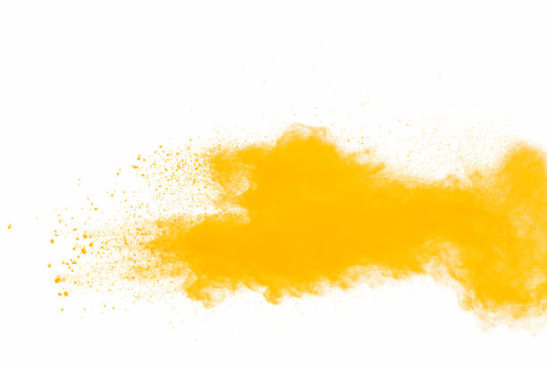istock Orange powder dust particles explosion on white  background.Orange dust particles splash. 1223974740