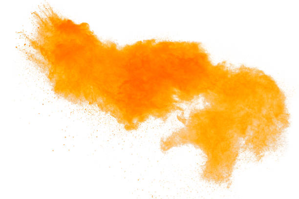 istock Orange powder dust particles explosion on white  background.Orange dust particles splash. 1223974744