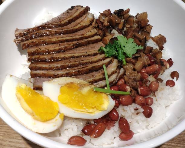 istock goose meat with egg and peanuts on rice 1223975878
