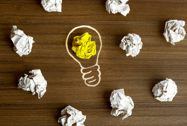 istock Inspiration concept crumpled paper light bulb metaphor for good idea 1223976296