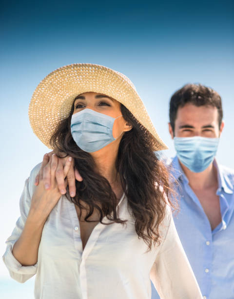 istock happiness couple doing a vacation at seaside during the covid 1223979029