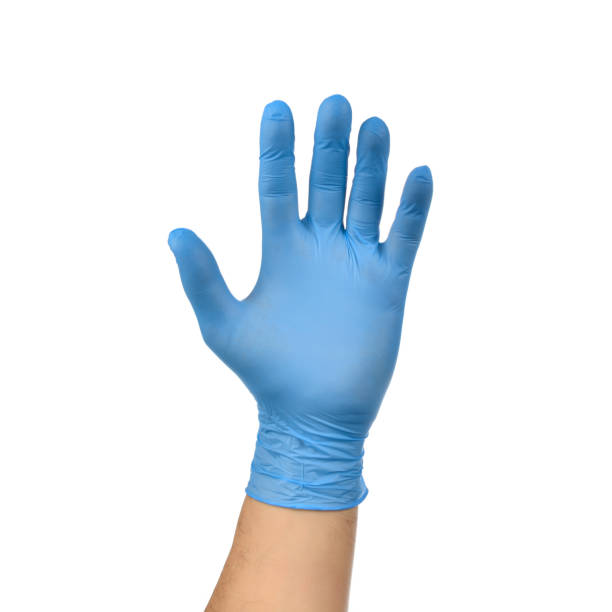 istock Left hand in blue medical glove isolated on white background. 1223979996