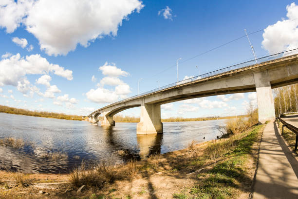 istock Clouds over the bridge over the Volkhov river. 1223980218