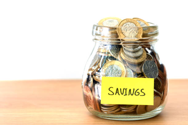 Savings pot Money in a pot golden nest egg taxes stock pictures, royalty-free photos & images