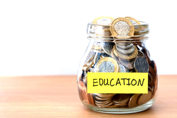 Education savings pot Money in a pot golden nest egg taxes stock pictures, royalty-free photos & images