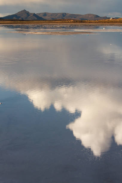 During the rain season, Uyuni´s salt flat is covered by water, and you can see clouds reflected on the water, and it can be crossed by cars