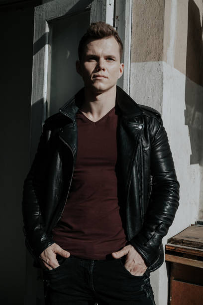 istock Portrait of a handsome young man in a black jacket 1223982996