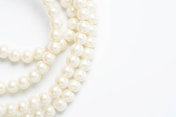 istock pearl necklace isolated on white blackground 1223984519