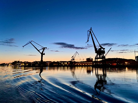 Cranes in Gothenburg harbor, view from the sea