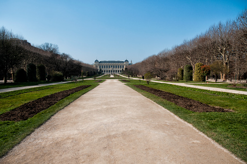 Paris 5 : Jardin des Plantes, with Museum national d'Histoire Naturelle in background,  is empty during pandemic Covid 19 in Europe. There are no people because people must stay at home and be confine. Schools, restaurants, stores, museums... are closed - Paris, in France. March 18, 2020.