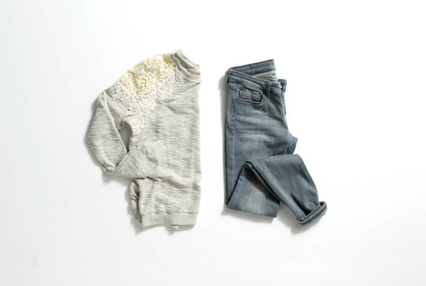 istock Beige shirt and gray denim jeans 1223989144
