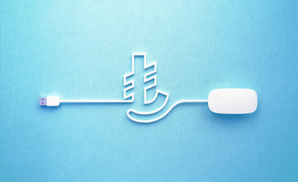 istock White Mouse Cable Forming Turkish Lira Sign On Blue Background 1223991375
