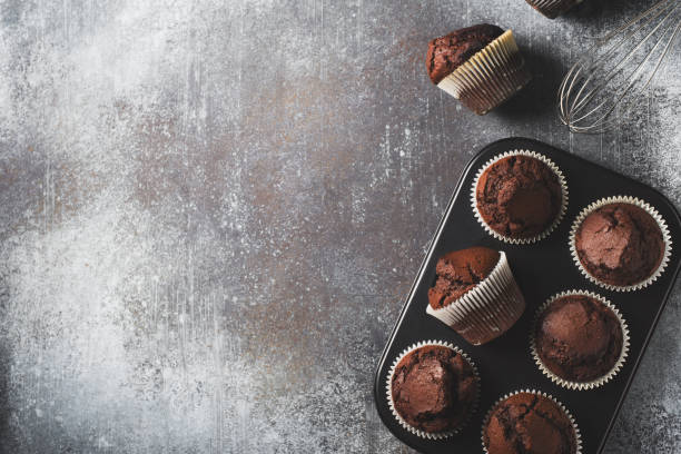 istock Chocolate brownies cacao muffins flat lay, baking concept 1223994464