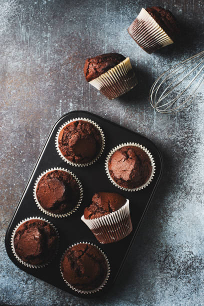 istock Chocolate brownies cacao muffins flat lay, baking concept 1223994466