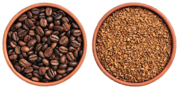 istock Roasted coffee beans and instant granular coffee in a bowl isolated on a white background. View from above. 1223994840