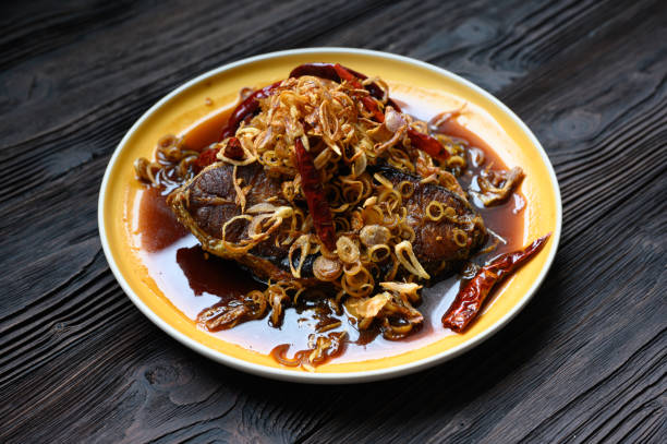 istock Fried fish with lemon grass, sweet sauce 1223996070