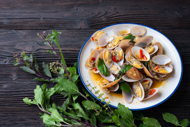 istock Stir fried Spicy Clam (Surf clam, Short necked clam, Carpet clam, Venus shell, Baby clam) with Thai Holy Basil 1223996099